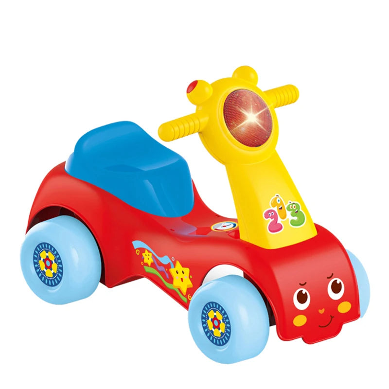 Porteur HUANGER Baby Music Rider vu de trois quarts, chiffres 1-2-3 sur la colonne et visage souriant à l'avant