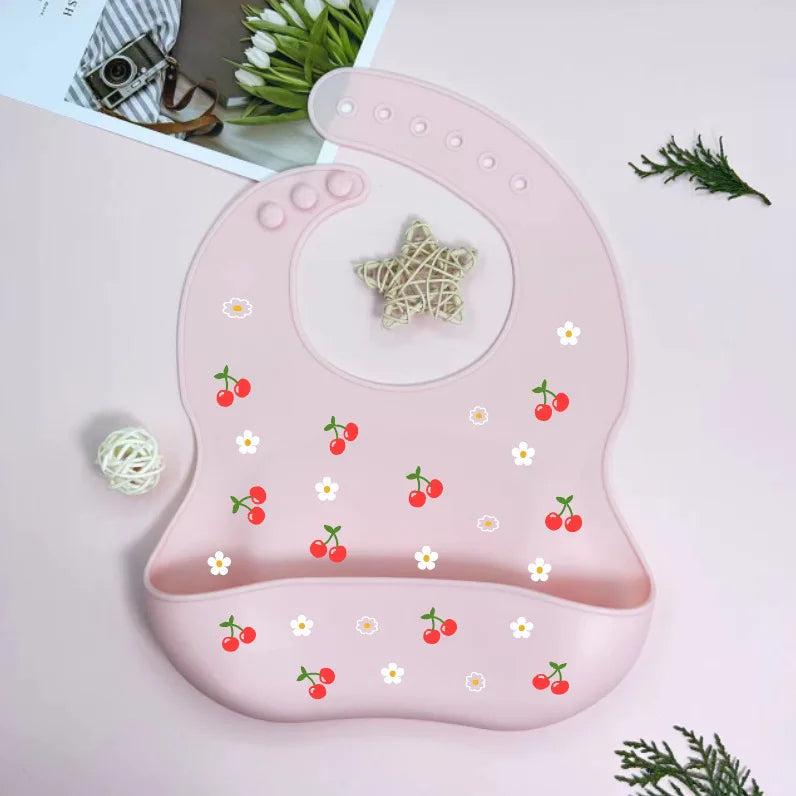 Bavoir en silicone - CERISE