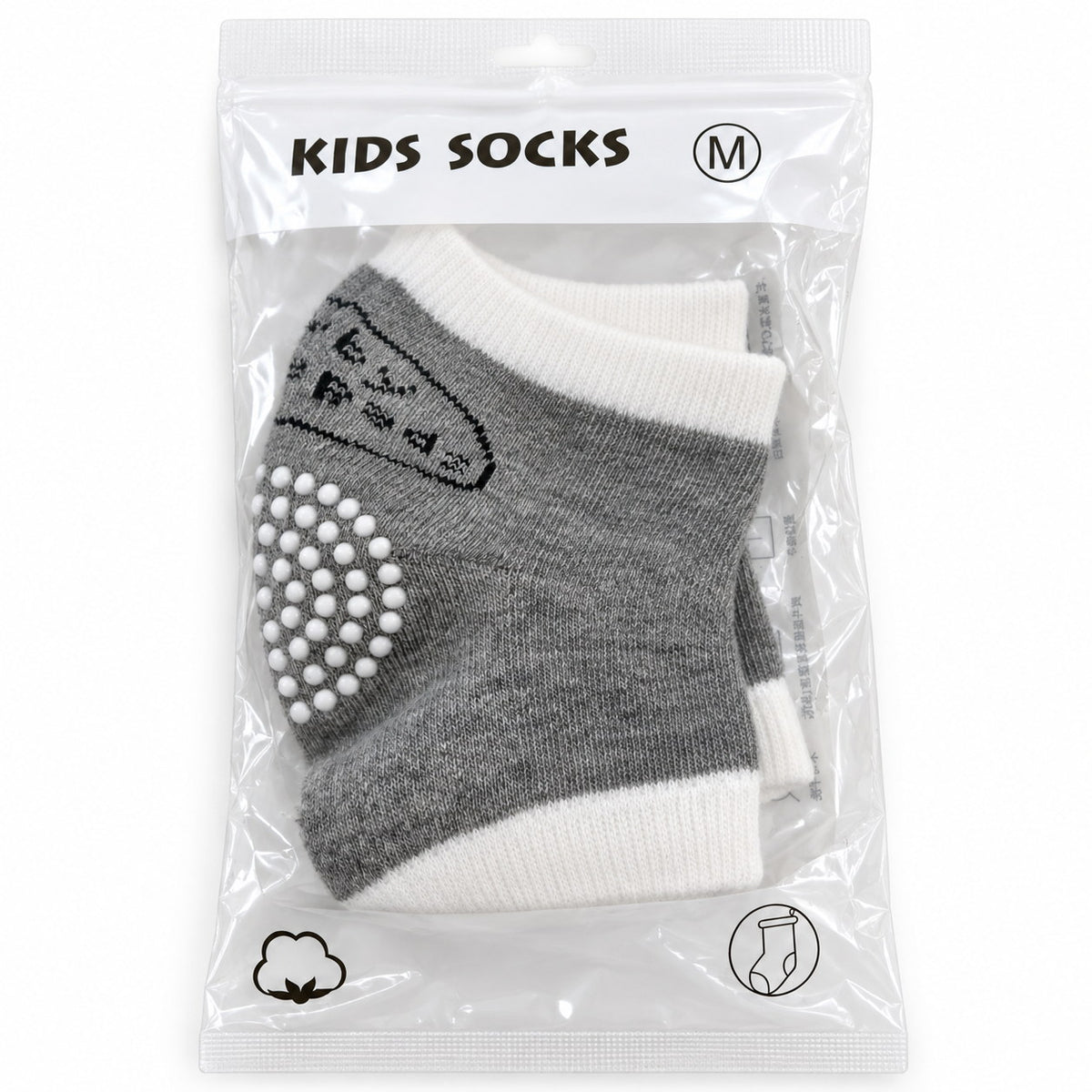 Chaussettes enfant grises et écru en sachet, picots antidérapants blancs sous le pied, taille M
