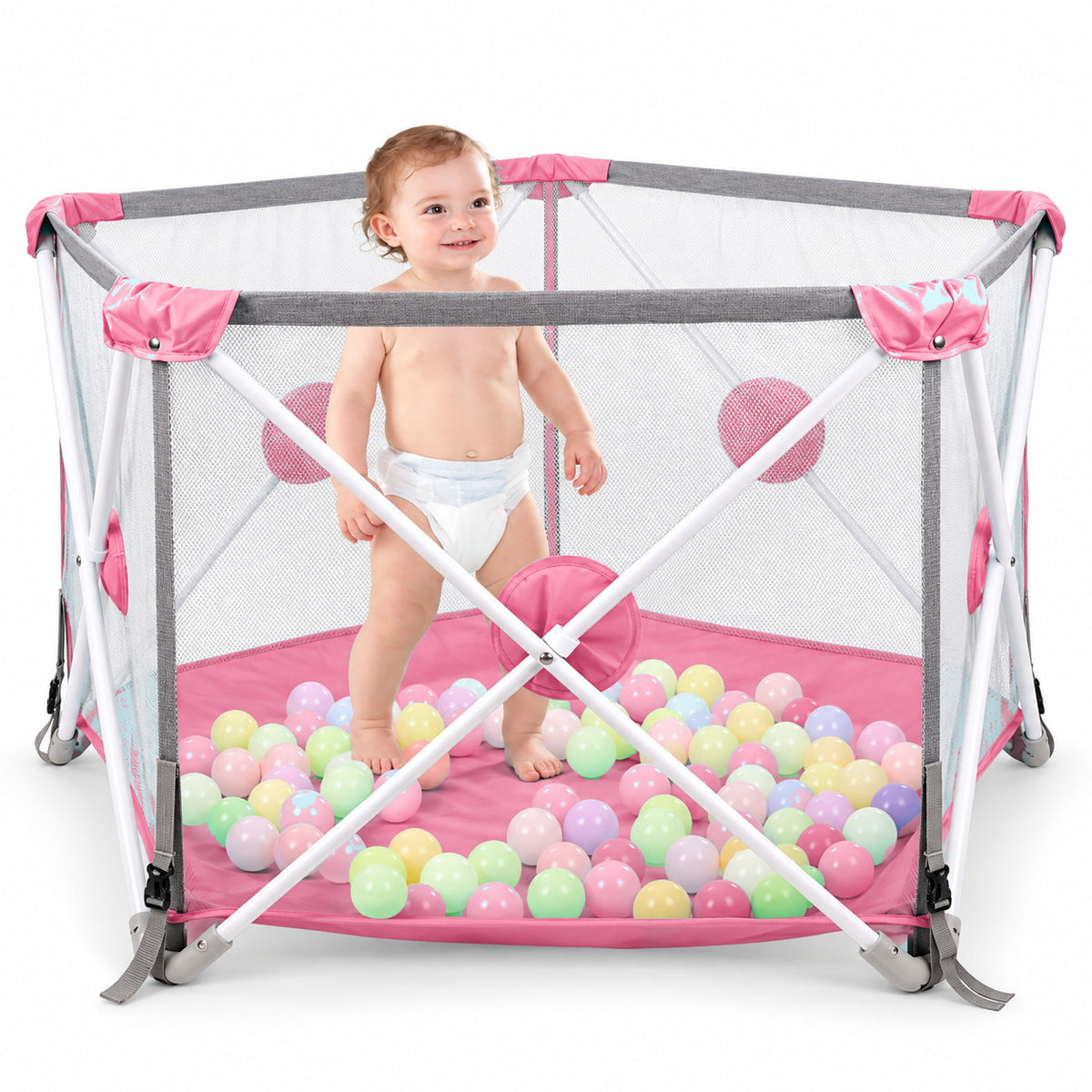 Parc bébé pliable hexagonal rose à 6 panneaux en filet, tapis de sol matelassé et bébé debout à l'intérieur