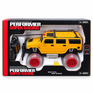 4x4 radiocommandé Performer Super Racing jaune dans sa boîte avec télécommande