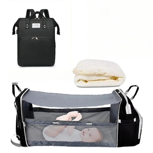 Sac à langer 3 en 1 coloris noir avec son lit d'appoint déplié