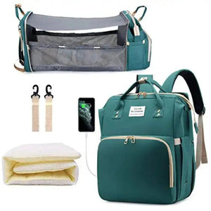 Sac à langer 3 en 1 coloris vert avec crochets de poussette et matelas à langer