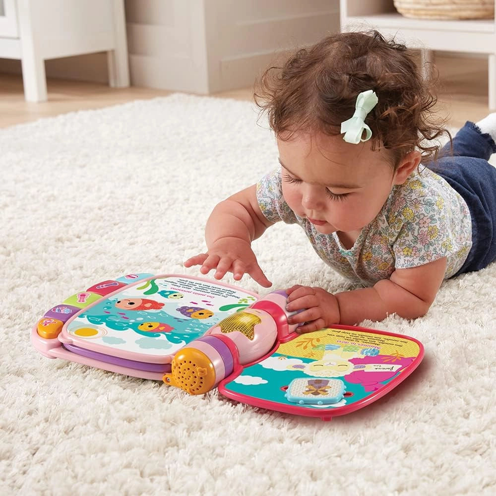 Pages interactives du Super livre enchanté rose VTech avec éléments à manipuler