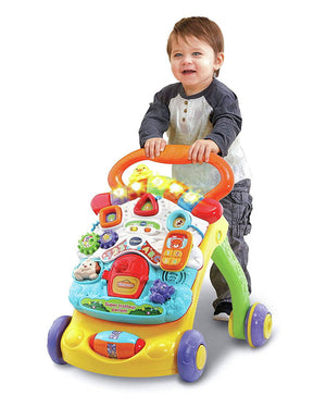 Enfant qui fait ses premiers pas avec le VTech Super Trotteur Parlant 2 en 1