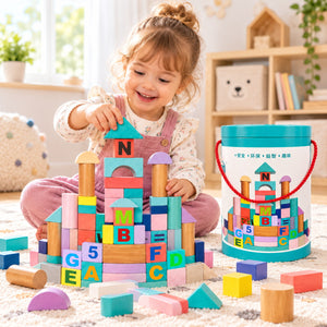 Enfant qui construit un château avec les blocs en bois pastel, baril de rangement à côté
