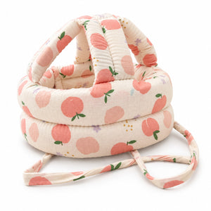Casque de protection anti-chute pour bébé en coton imprimé pêches, boudins rembourrés et cordons à nouer