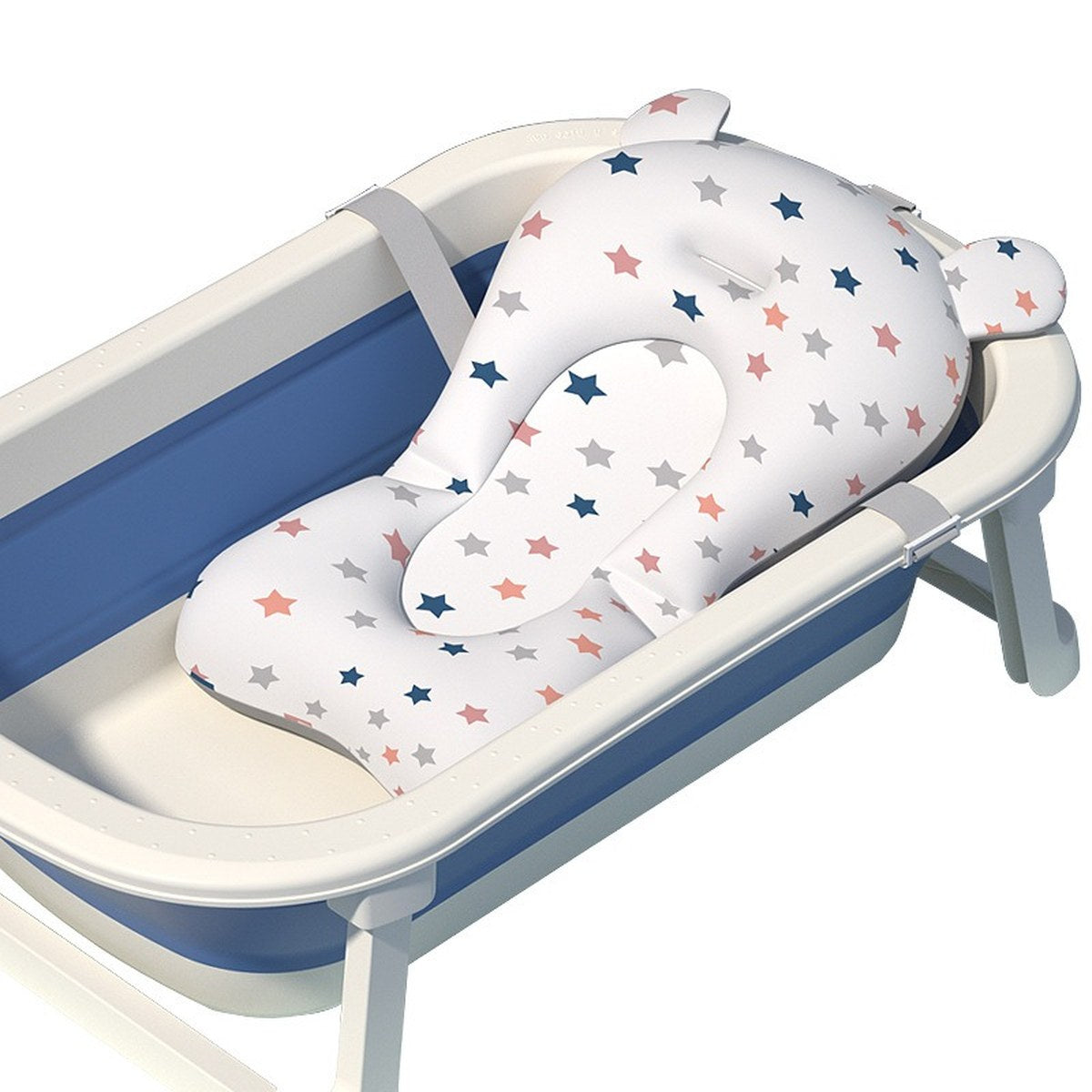 Coussin de bain bébé à étoiles installé et sanglé dans une baignoire pliable