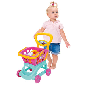 Petite fille poussant le chariot de courses Frozen Dede
