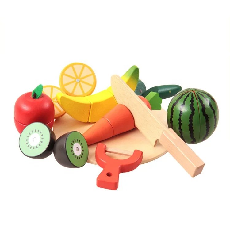 Fruits en bois séparés en deux moitiés montrant la pastille auto-agrippante