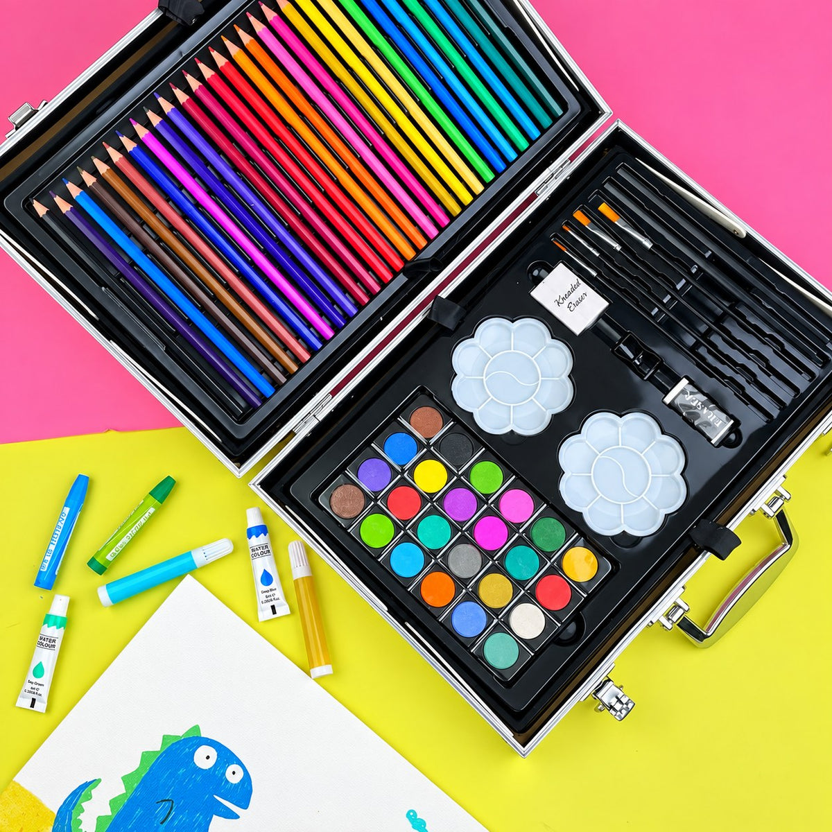 Godets d'aquarelle, deux palettes fleur, pinceaux et gomme malléable de la mallette d'art licorne