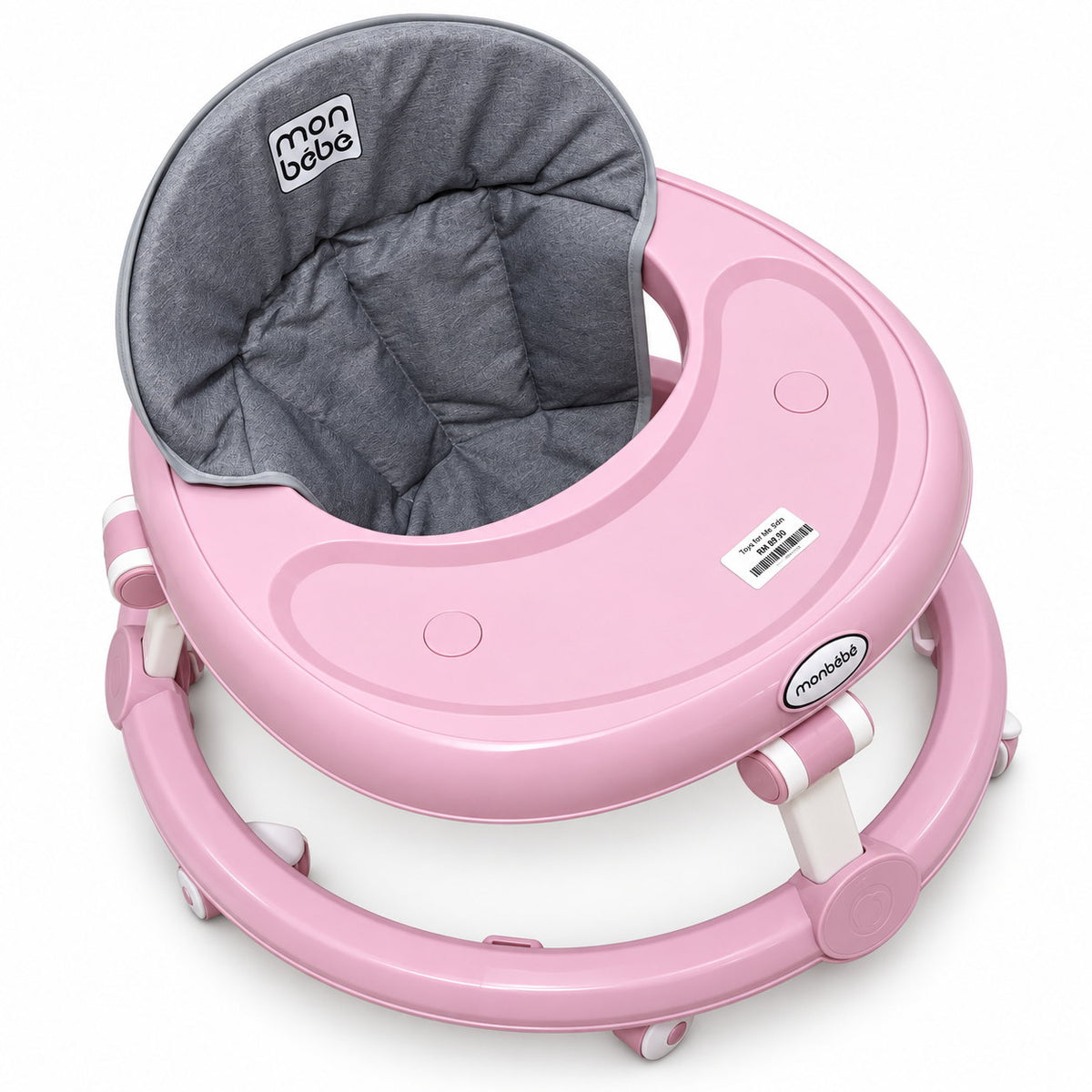 Vue de dessus du trotteur monbébé rose : plateau lisse, châssis rond et roulettes