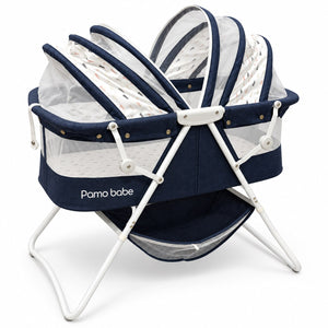 Couffin pliable Pamo Babe bleu marine : capote double à moustiquaire, panier de rangement et piétement en aluminium blanc