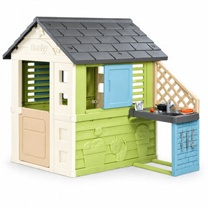 Maison Pretty Smoby Life : cabane de jardin vert anis et beige à toit anthracite avec cuisine d'été bleue