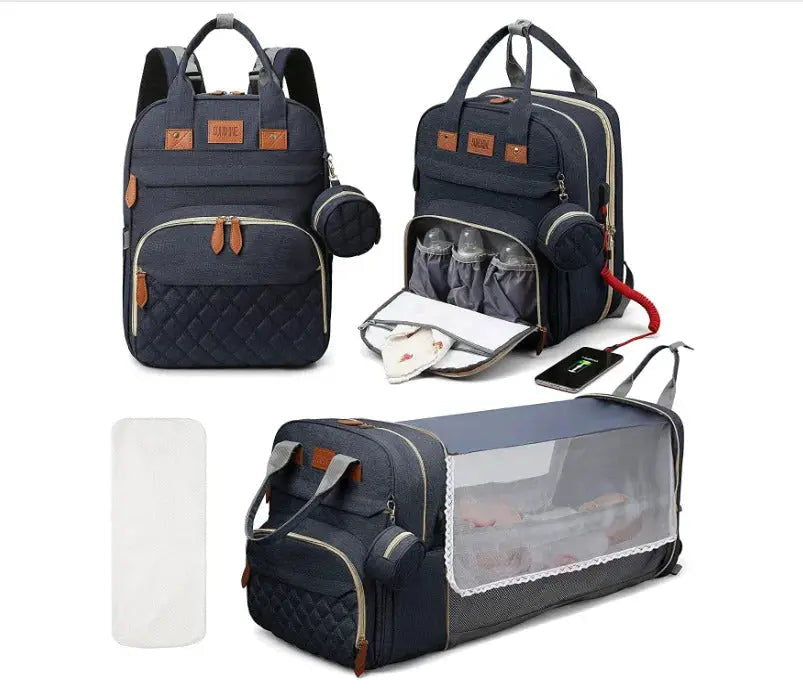 Sac à langer 3 en 1 coloris bleu marine avec matelas à langer et lit déplié