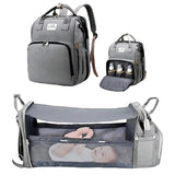 Sac à langer 3 en 1 gris, sac à dos et lit d'appoint déplié avec moustiquaire