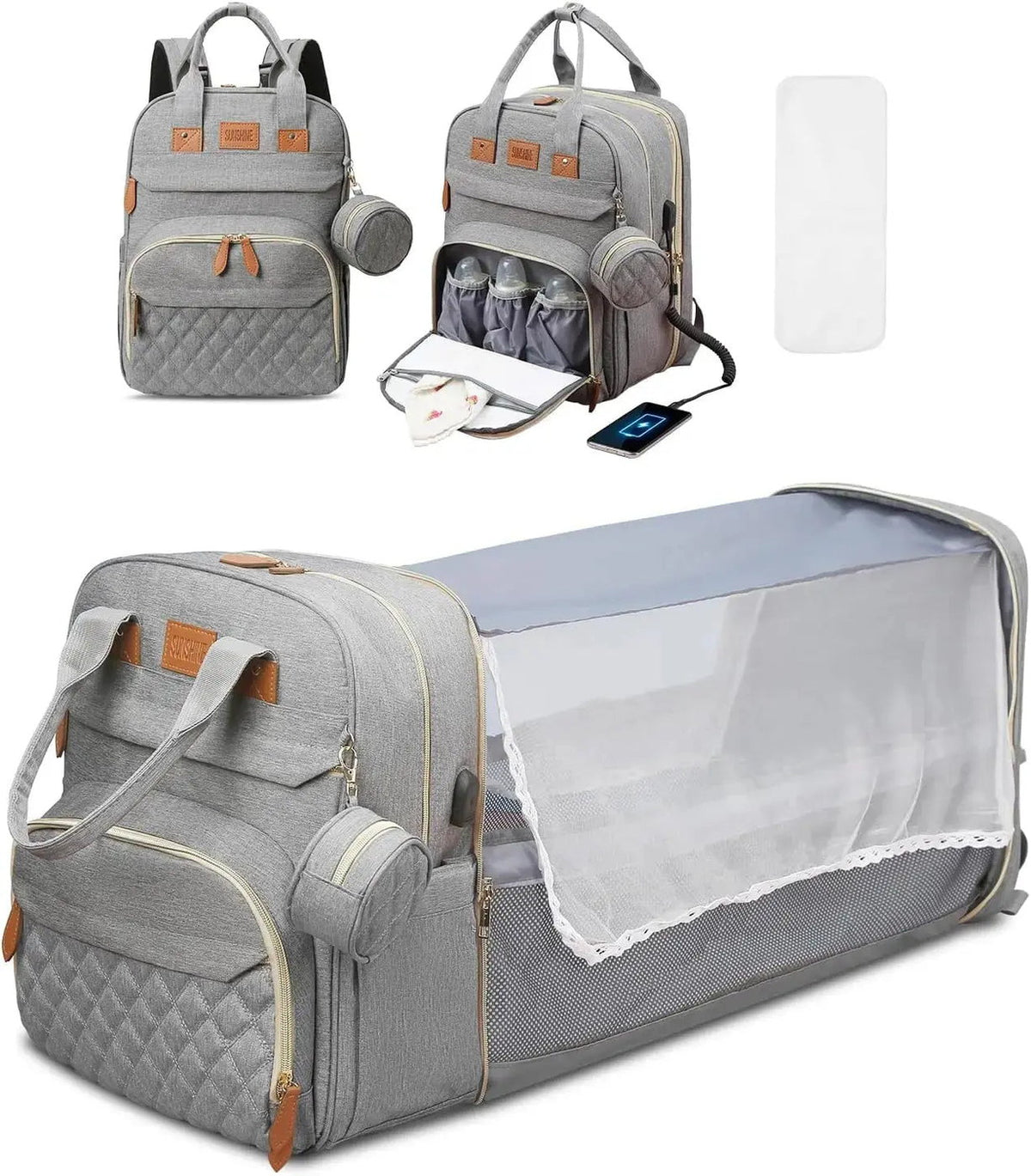 Lit d'appoint déplié du sac à langer, avec moustiquaire relevée