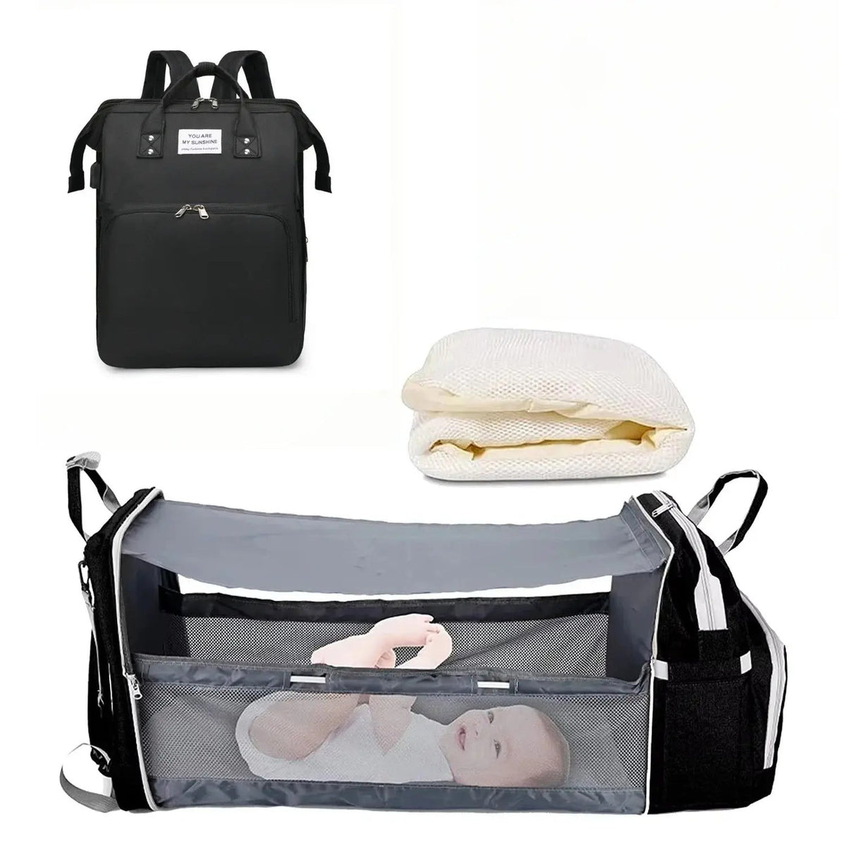 Sac à langer 3 en 1 coloris noir avec son lit d'appoint déplié