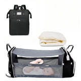 Sac à langer 3 en 1 coloris noir avec son lit d'appoint déplié